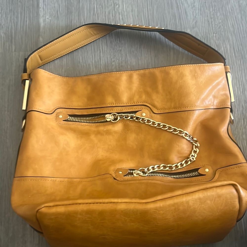 New large purse with matching wallet.